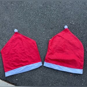 Chair covers 
Classic Red Santa Hats with White Trim set of two